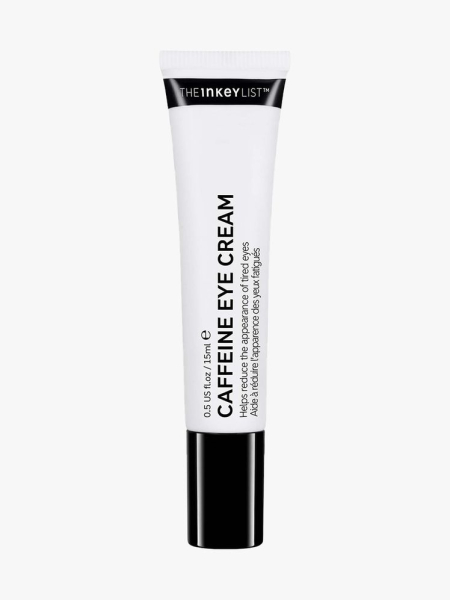 The Inkey List Caffeine Eye Cream white tube with black cap on light gray background