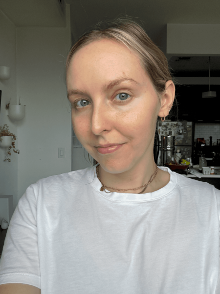 Image may contain Clothing TShirt Blouse Adult Person Face Head Photography Portrait Body Part Neck and Blonde