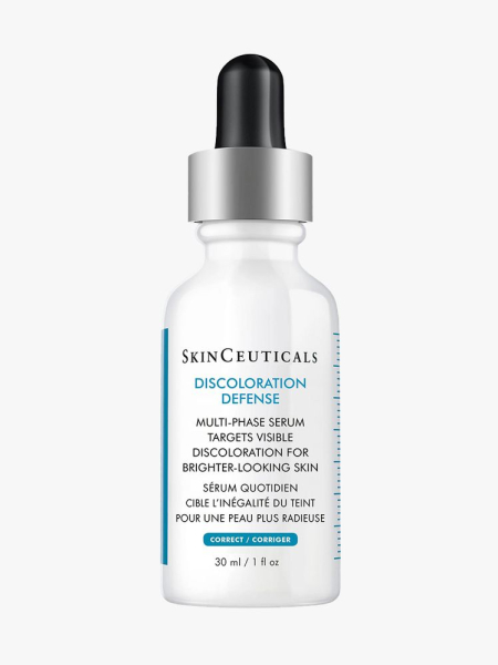 SkinCeuticals Discoloration Defense white serum dropper bottle with silver and black dropper cap on light gray background