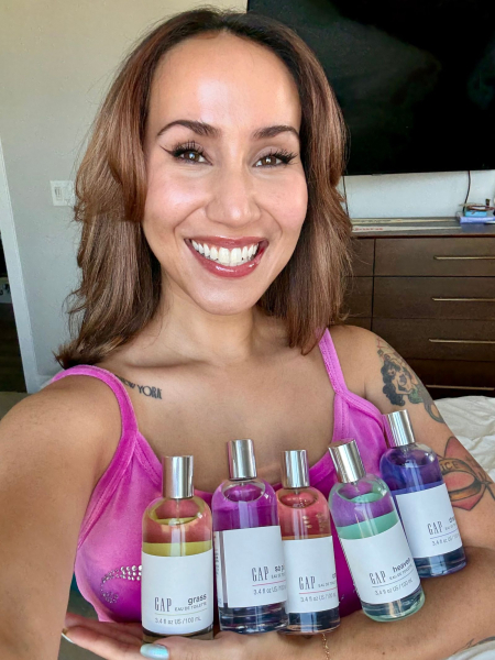 Marianne Mychaskiw holding Gap Perfumes Grass Dream Om Heaven and So Pink